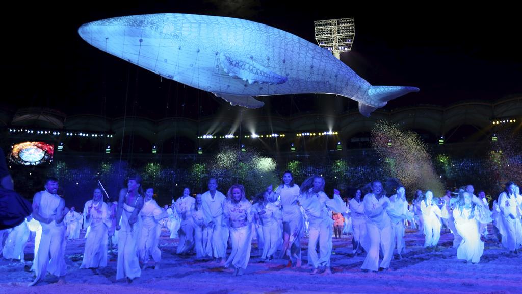 Frankly fishy: Dancers perform beneath a vast inflatable PICTURE: AP