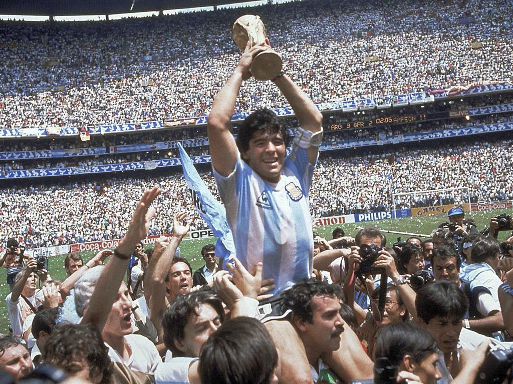 Dim and distant: Maradona with the World Cup in 1986 PICTURE: AP