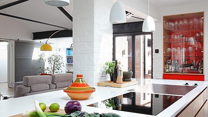 Lofty ambition: The ultra-modern kitchen with its own bar area