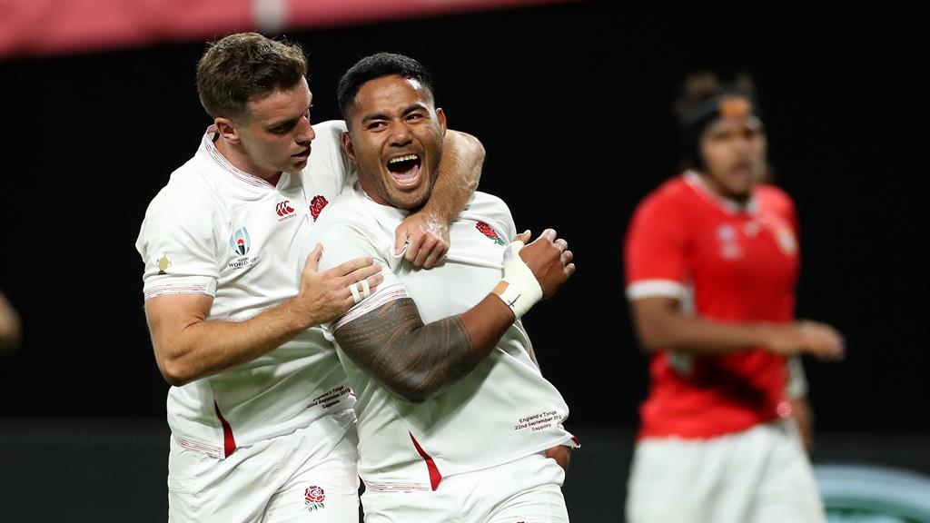 Ford celebrates with Manu Tuilagi, right, after scoring his second try during the Rugby World Cup 2019 Group C game between England and Tonga PICTURE: GETTY