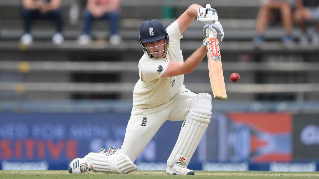 Partnership: Dom Sibley drives towards the boundary