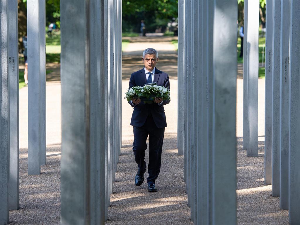 Tribute: Mayor of London Sadiq Khan lays a wreath at the 7/7 memorial in Hyde Park yesterday PICTURE: PA
