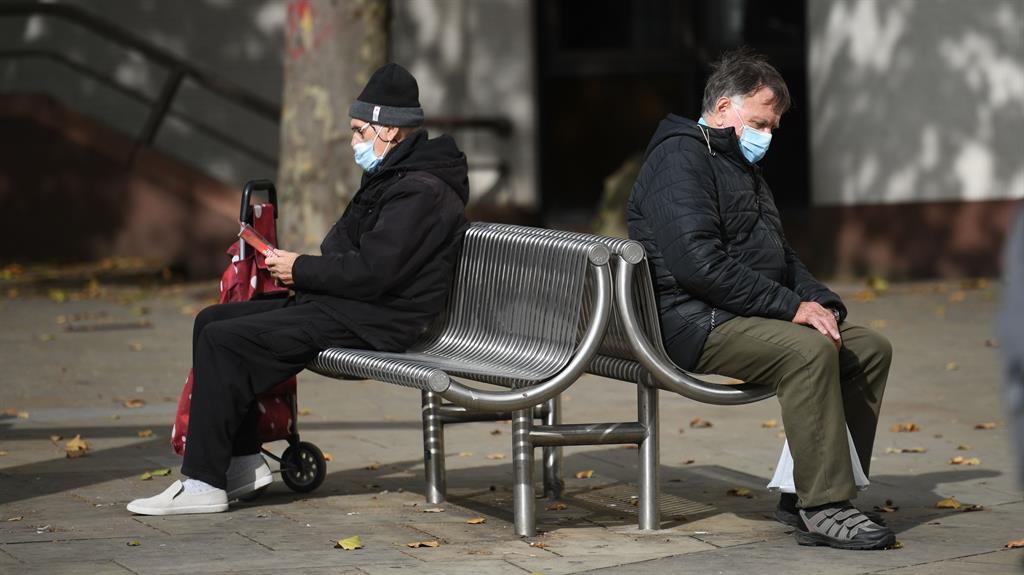 Killing time: Two people rest in central Nottingham PICTURE: GETTY