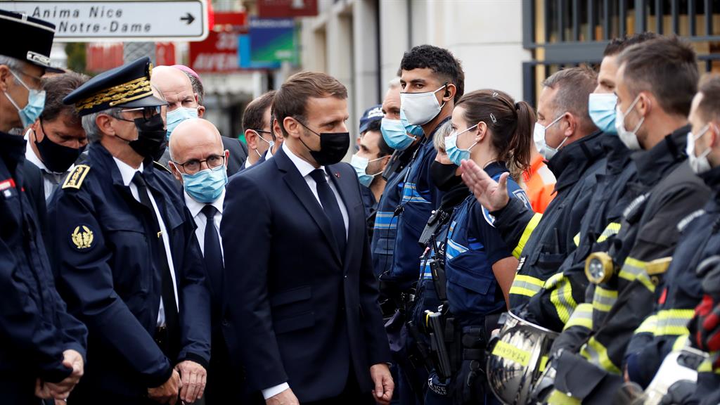 Investigation: French president Emmanuel Macron visits the scene of the attack in Nice PICTURE: REUTERS