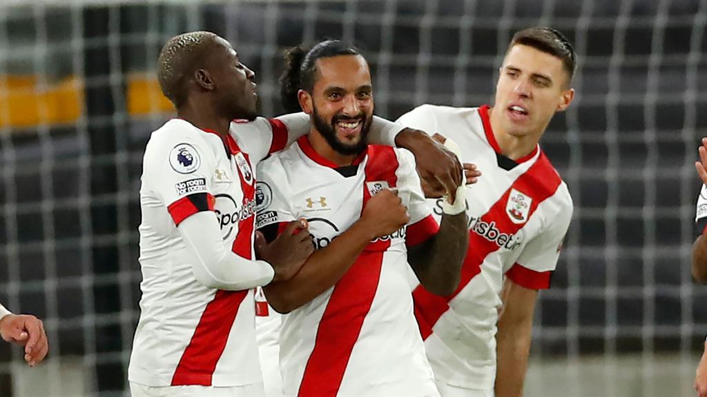 Honours even Walcott celebrates getting back on the scoresheet for Southampton before Neto levels for Wolves