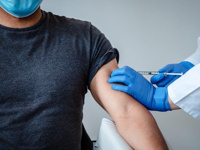 Action: To return to normality, we need to stop the virus from spreading – and we don’t yet know if Pfizer’s vaccine will help achieve that PICTURE: EPA