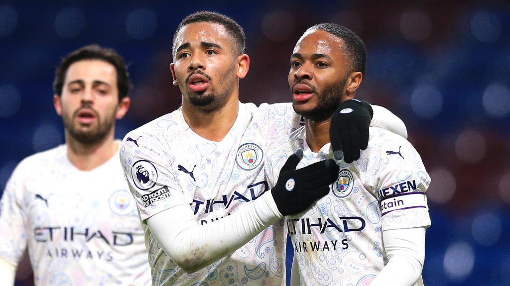 Strike twins Opening scorer Jesus congratulates Sterling after the England forward makes it 2-0
